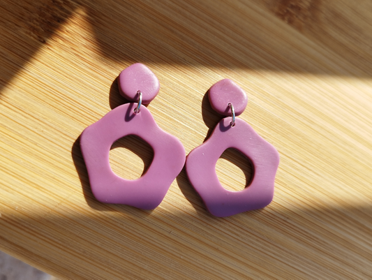 Abstract Flower in Dusky Orchid colour, Handmade Polymer Clay Earrings. The base of the Earrings is an abstract convex polygon attached to a jump ring to the Abstract Flower shape hanging from it.